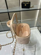 Beige mini handbag open top with quilted sides and gold-tone chain strap