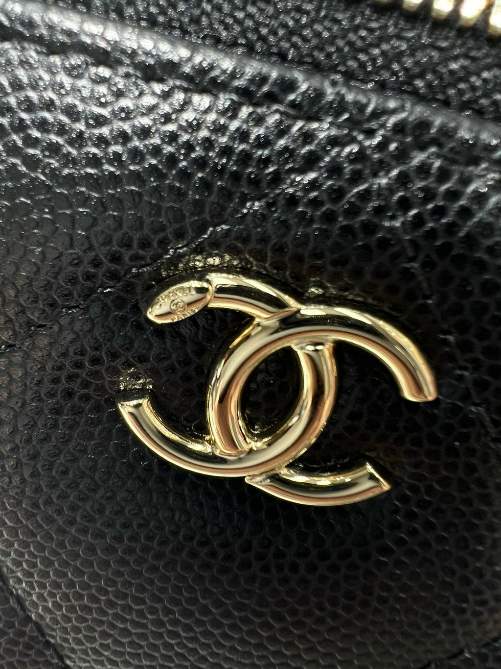 Gold CC logo on black textured leather mini bag