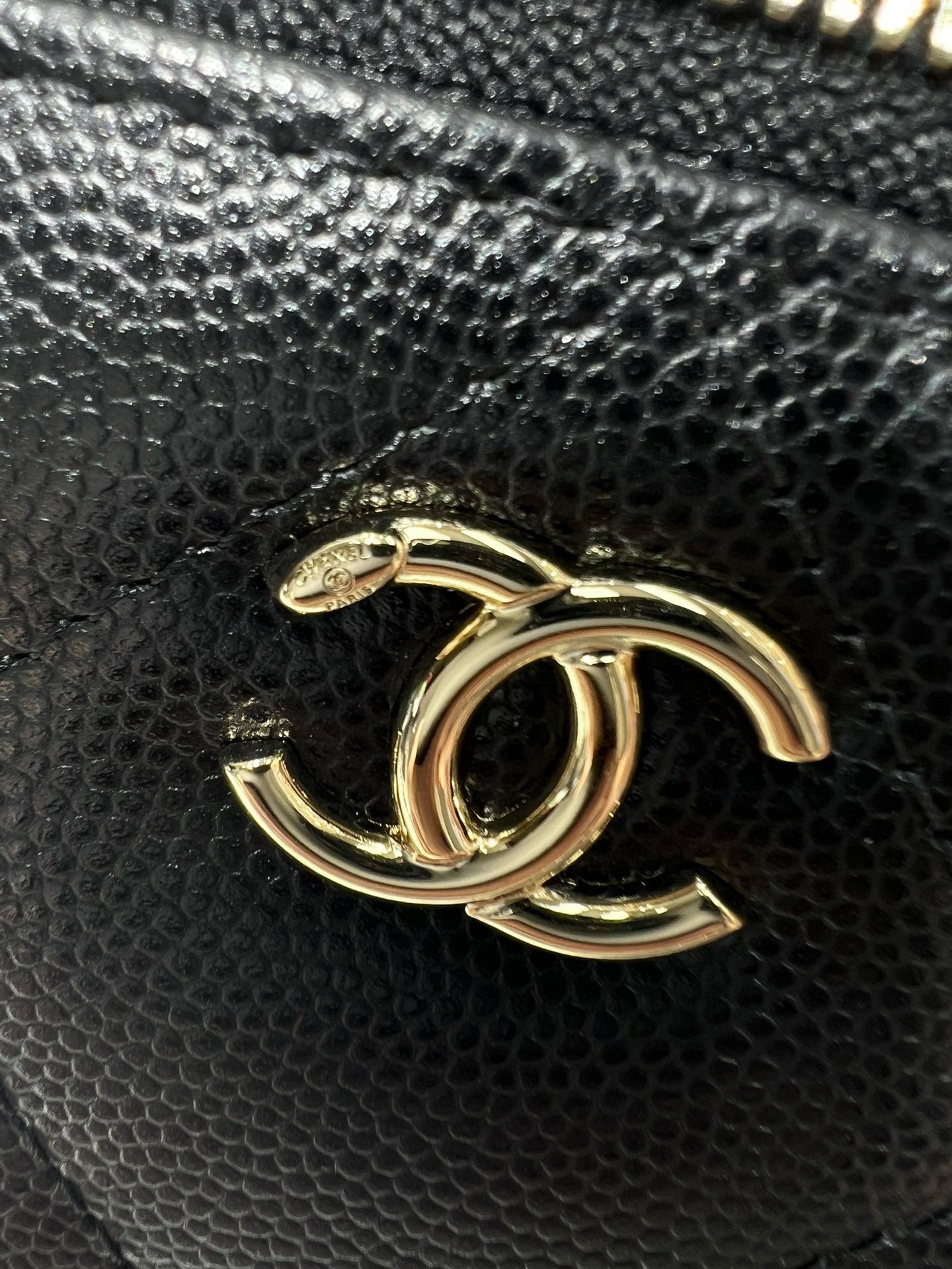 Gold CC logo on black textured leather mini bag