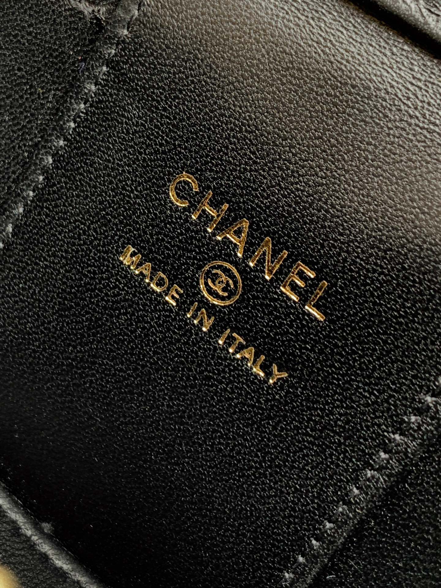 CHANEL Paris Tailor logo on black bag lining