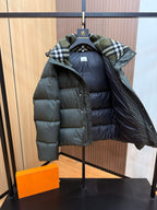 Burberry dark green puffer jacket, plaid-lined hood, open side view, zip front