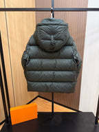 Burberry dark green puffer jacket, back view with attached hood and center seam