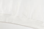 White crewneck sweatshirt hem with ribbed waistband