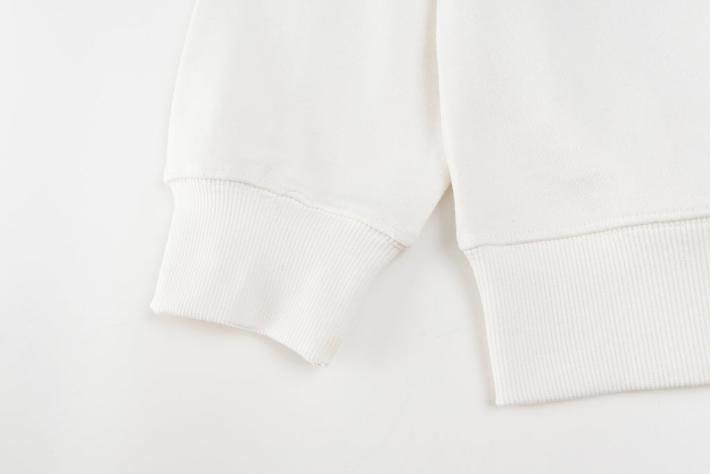 White crewneck sweatshirt sleeves with ribbed cuffs