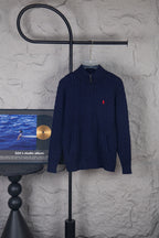 Navy knit quarter-zip sweater with ribbed collar and red Polo pony