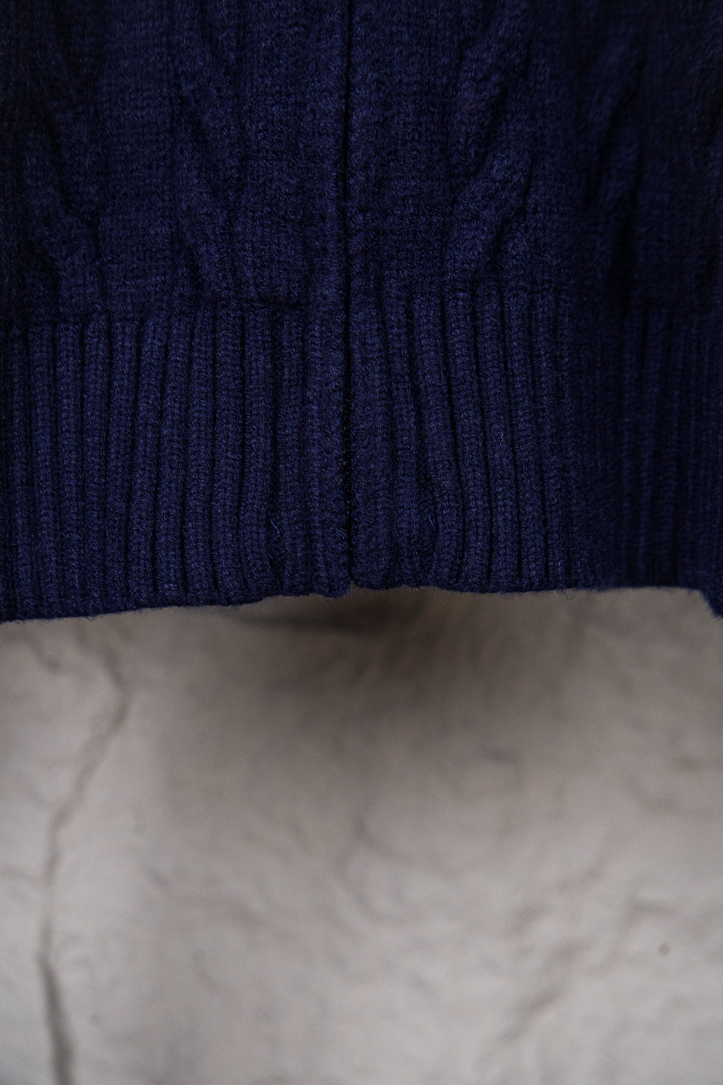Cable knit sweater with ribbed hem in dark navy