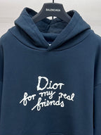 Dark blue hoodie with large white 'Dior for my real friends' lettering on chest