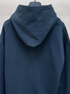 Dark blue hoodie back view with hood and no visible graphics