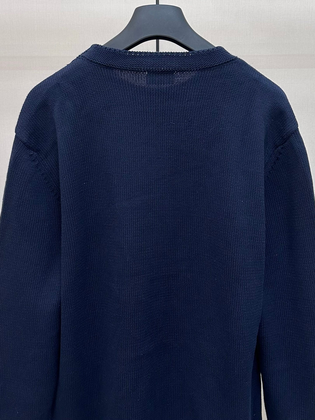 Navy Dior knit sweater back with ribbed crew collar and knit texture