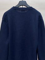 Navy Dior knit sweater back with ribbed crew collar and knit texture