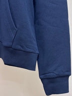 Navy hoodie with ribbed hem and long sleeves
