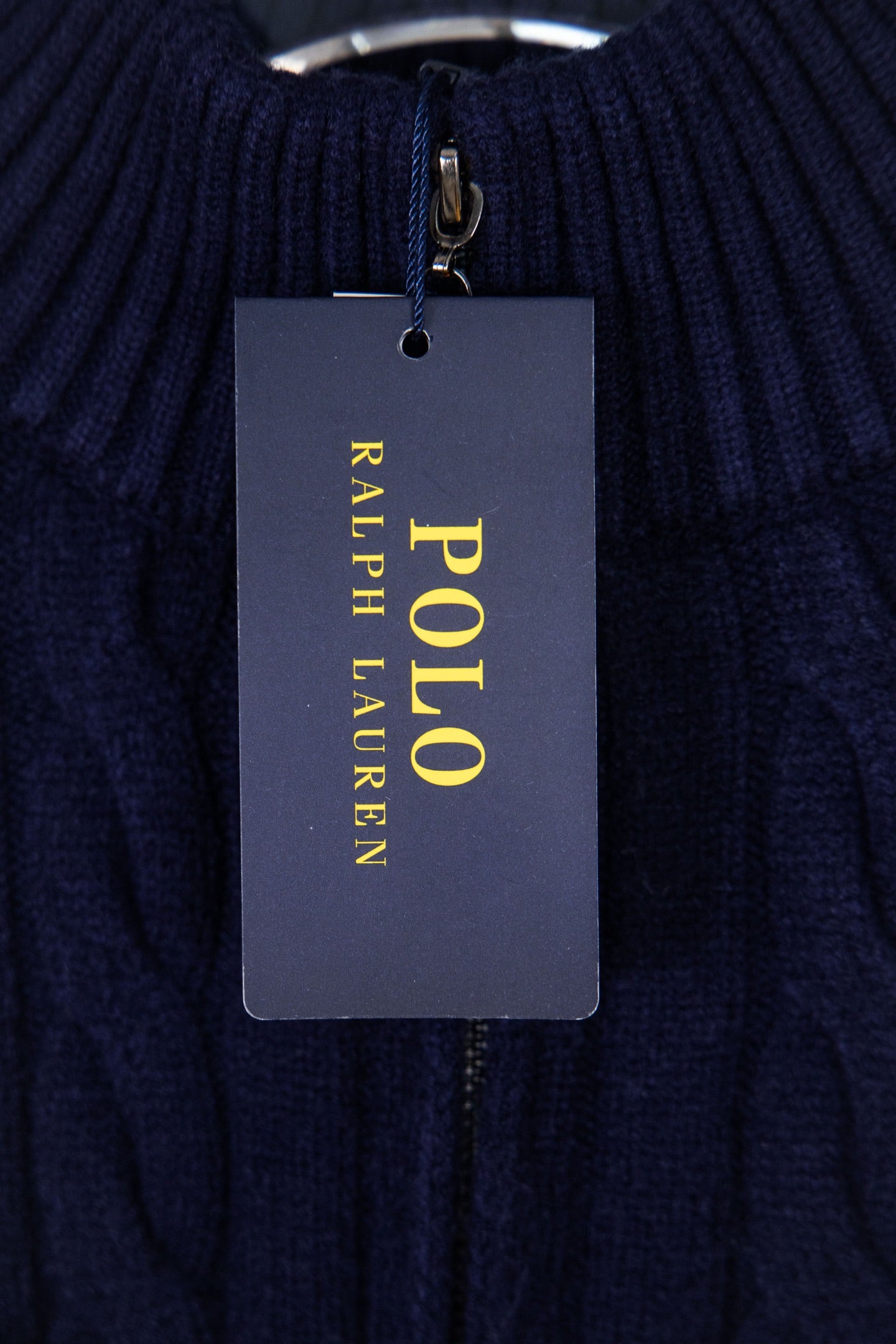 Navy quarter-zip sweater with Polo Ralph Lauren hang tag