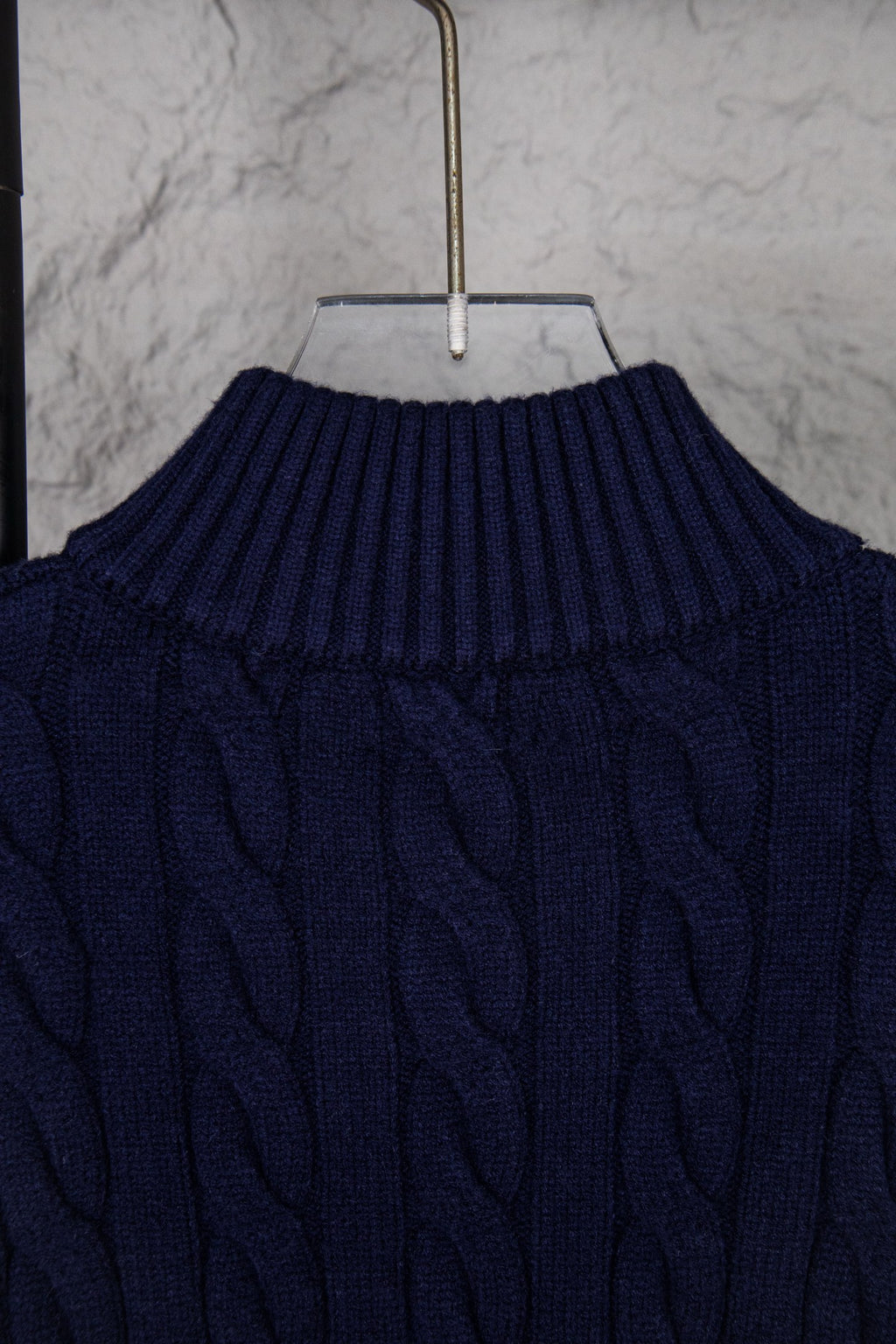 Navy cable-knit sweater high ribbed turtleneck collar