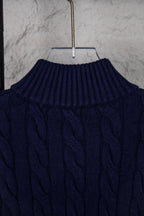 Navy cable-knit sweater high ribbed turtleneck collar