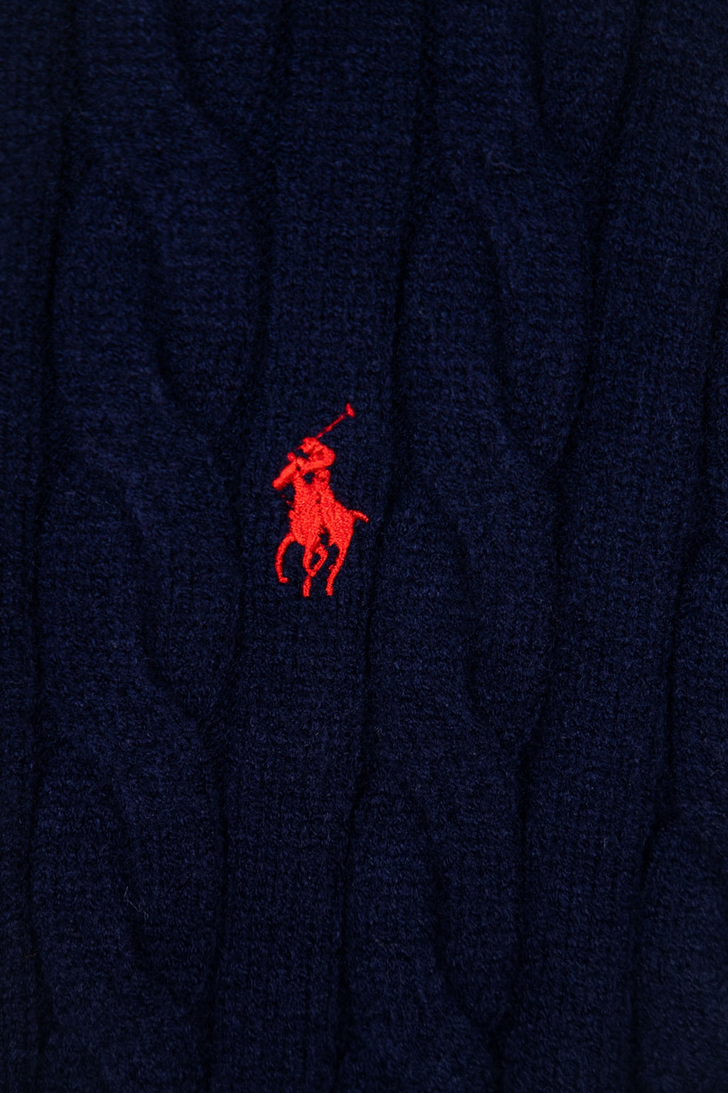 Navy quarter-zip sweater with small red Polo rider logo
