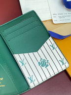 Louis Vuitton small bag wallet, teal green interior card slots and patterned flap