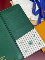 Teal small wallet interior card slots with stitched edges and striped panel