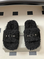 Black Balenciaga slide sandals with double-stud strap and oval metal buckle
