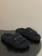 Black Balenciaga shearling-style sandals with front buckle straps