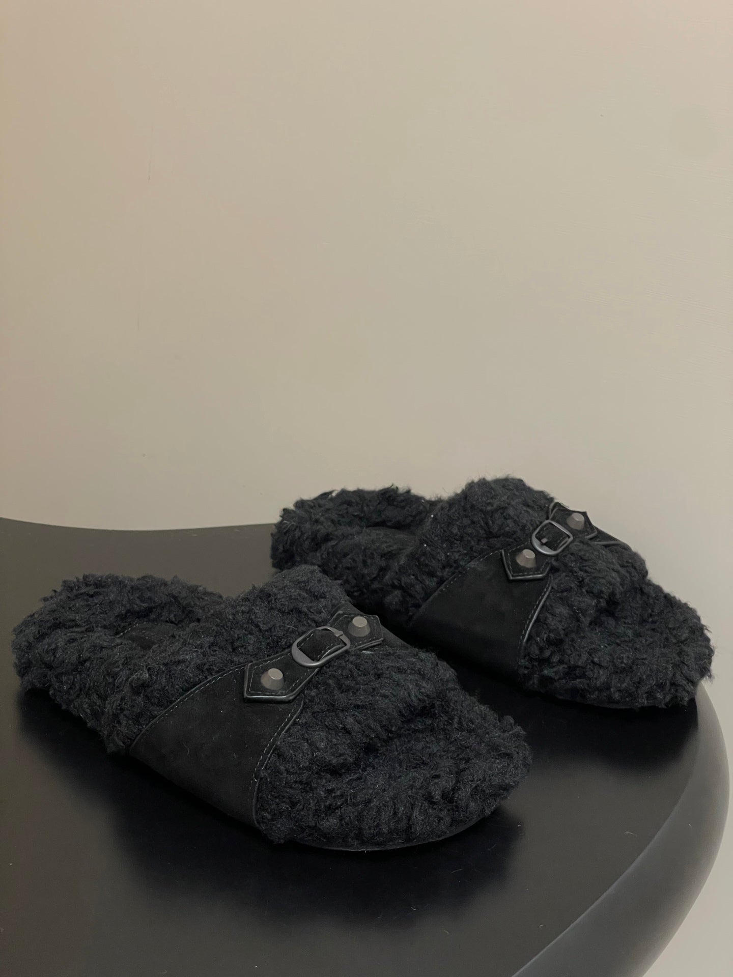Black Balenciaga shearling-style sandals with front buckle straps