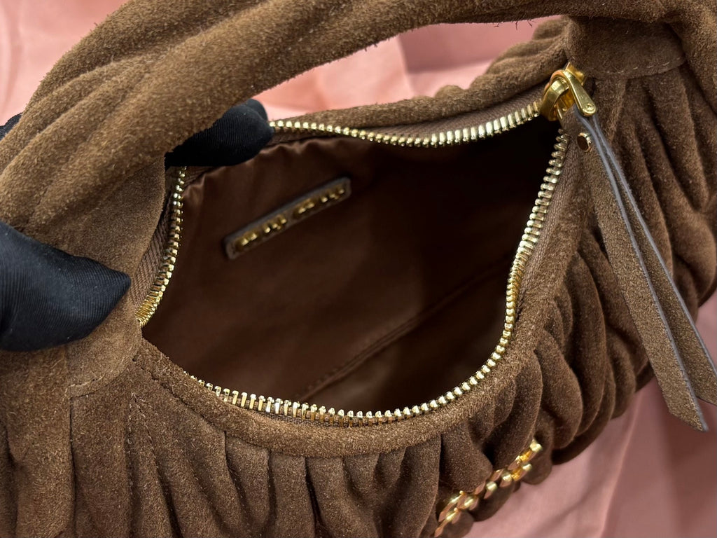MiuMiu ruched hobo bag inner pocket detail with zipper, olive-brown exterior
