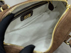 Suede mini handbag interior with patterned lining and embossed miumiu label