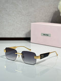 MiuMiu gold-tone sunglasses with dark gradient lenses and logo temple tips