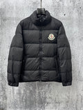 Long puffer jacket, dark color, front zip and small chest logo patch