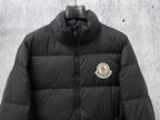 Long puffer jacket upper front with front zipper and chest logo patch