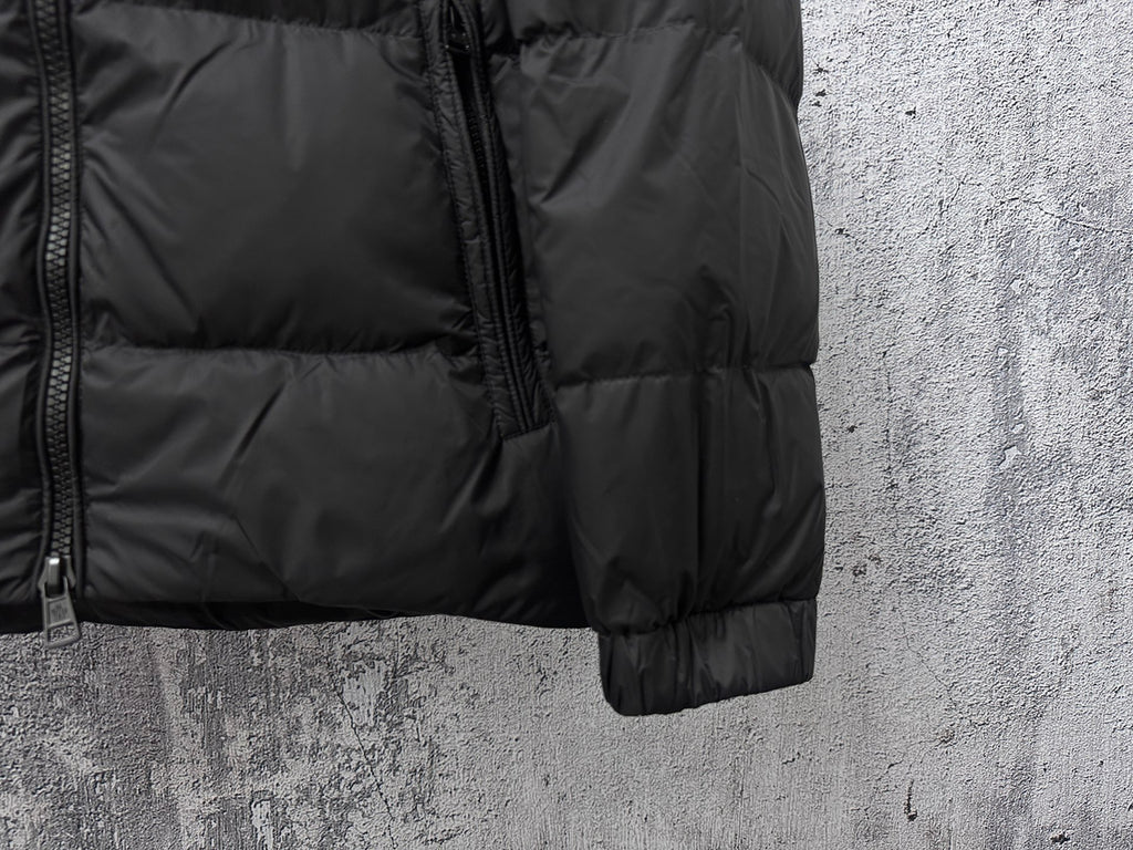 Long puffer jacket sleeve cuff with front zipper detail in dark color