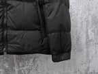Long puffer jacket sleeve cuff with front zipper detail in dark color