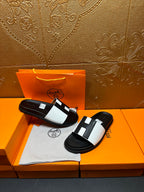 Hermes slide sandals pair, black sole with white strap and black insets