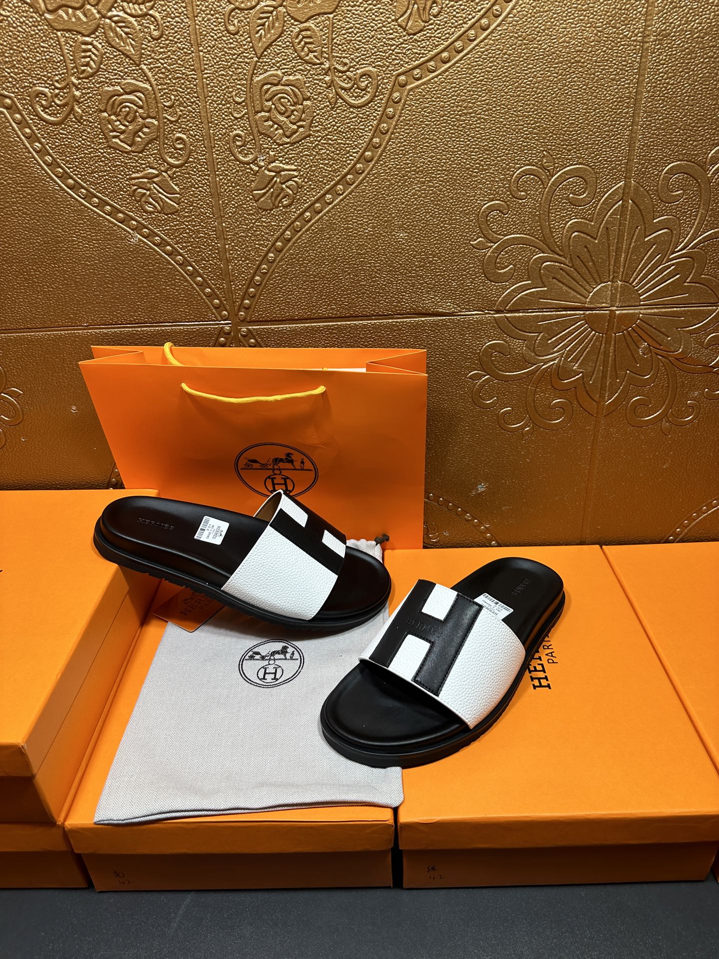 Hermes slide sandals pair, black sole with white strap and black insets