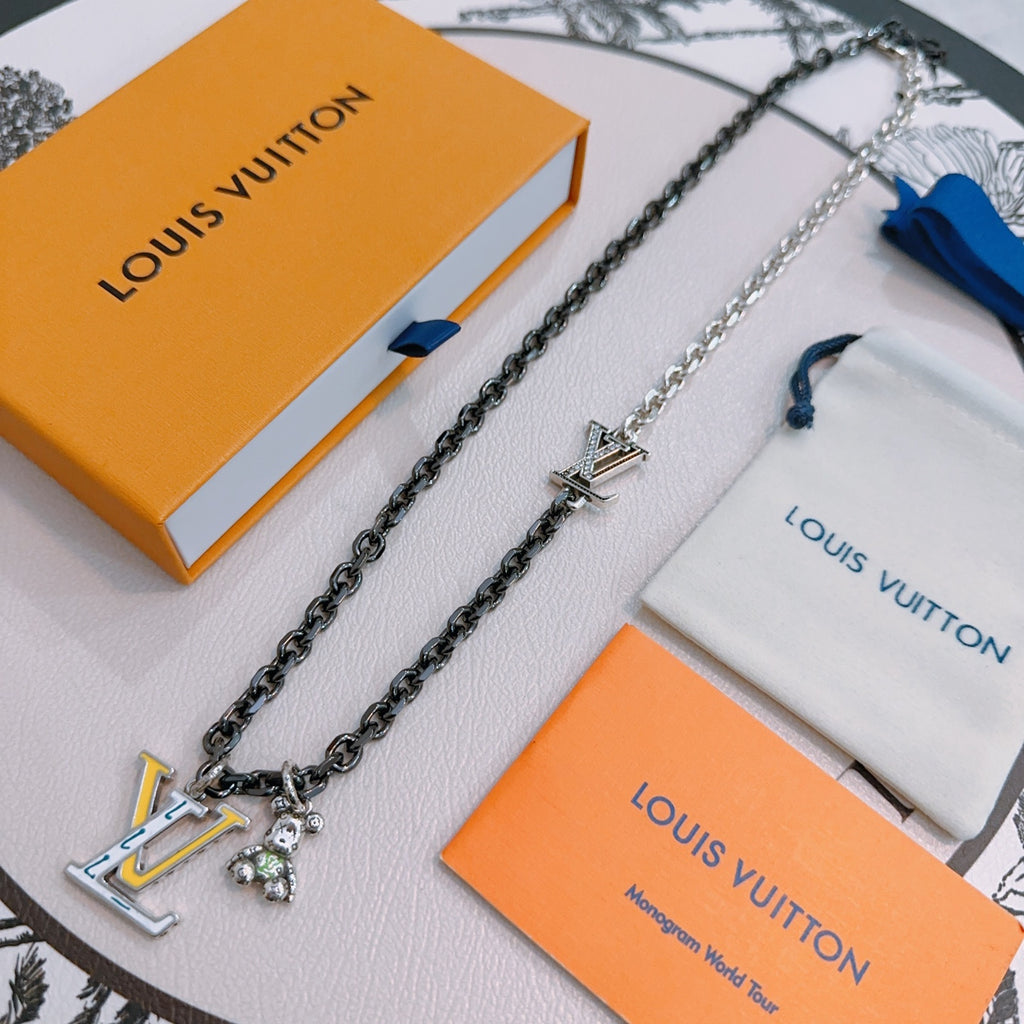 Louis Vuitton necklace on boxes, silver-tone and dark-tone chains with LV charm and beads