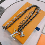 Louis Vuitton necklace, silver-tone chain with large LV charm pendant
