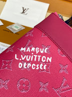 Louis Vuitton small pink bag with Monogram pattern and zipper pull