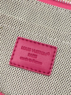 Pink Louis Vuitton Paris logo leather patch on woven clutch bag