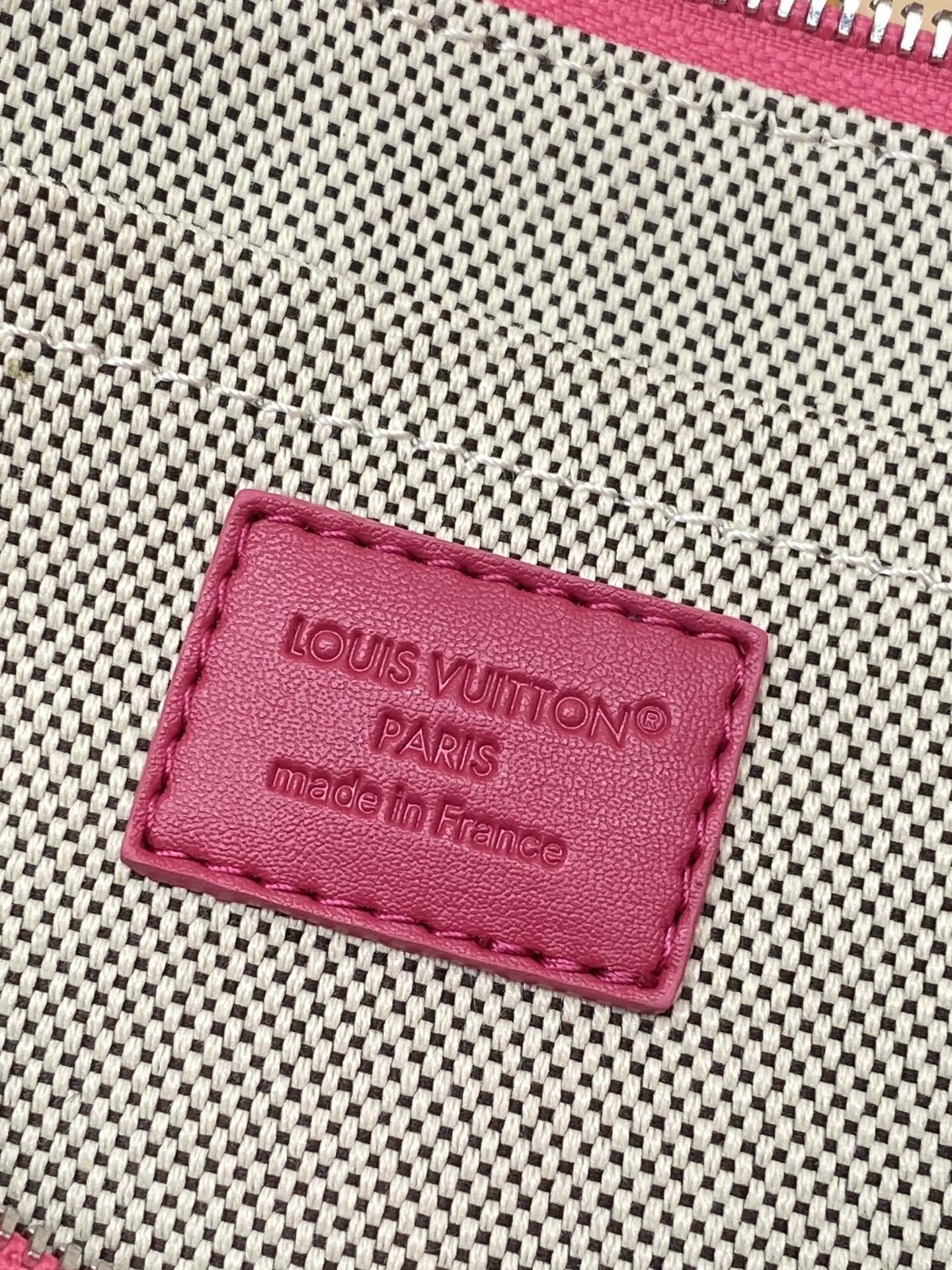 Pink Louis Vuitton Paris logo leather patch on woven clutch bag