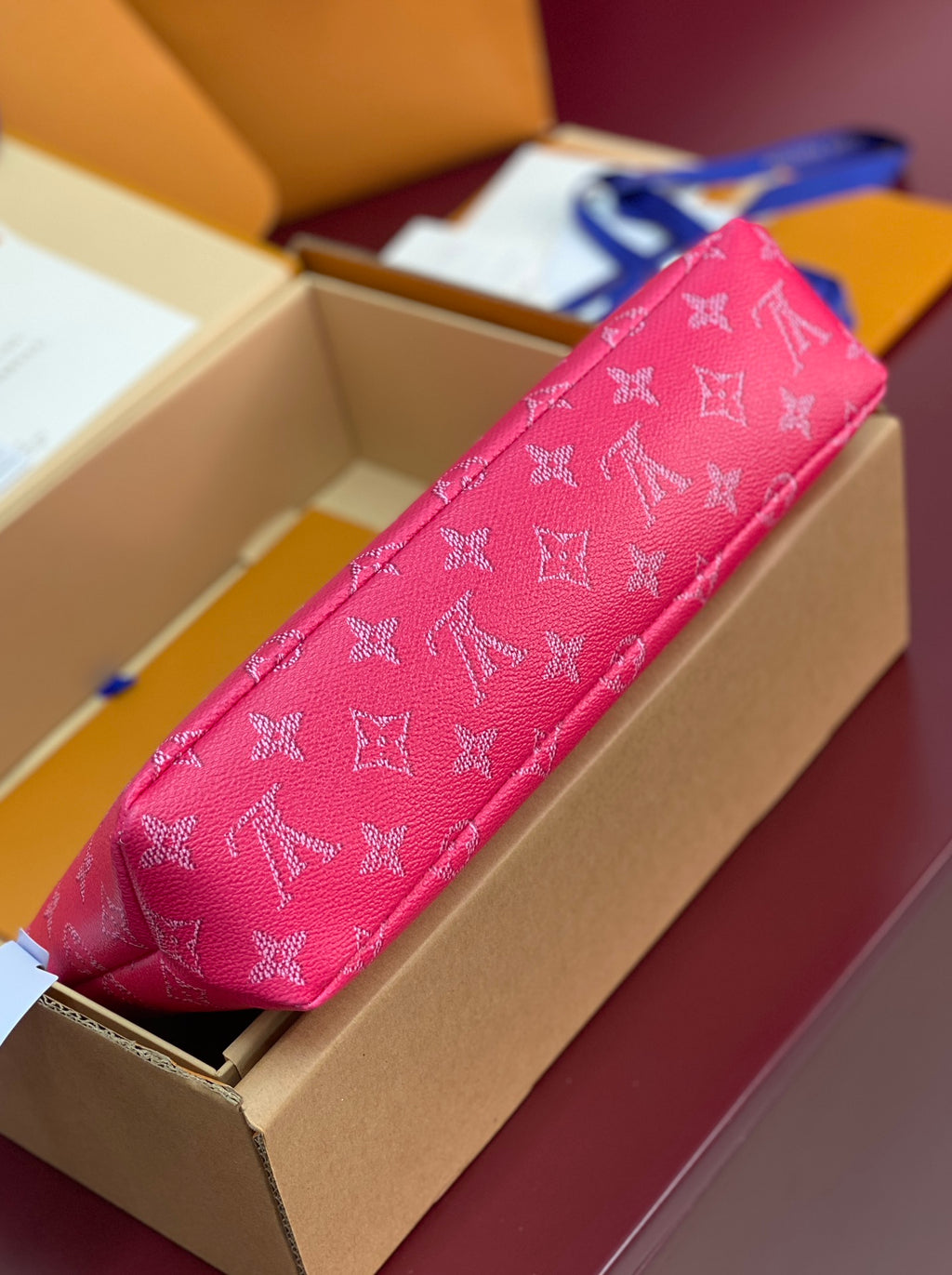 Louis Vuitton pink monogram small clutch bag long view with zipper top