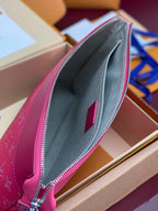 Louis Vuitton pink monogram small clutch bag interior lining and red logo patch
