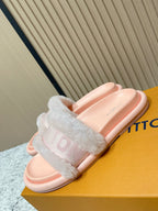 Louis Vuitton pink slide sandals with fuzzy strap and smooth footbed
