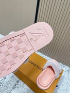 Louis Vuitton pink slide sandals outsole with fuzzy strap close-up