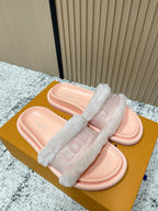 Louis Vuitton pink slide sandals front view with fuzzy band