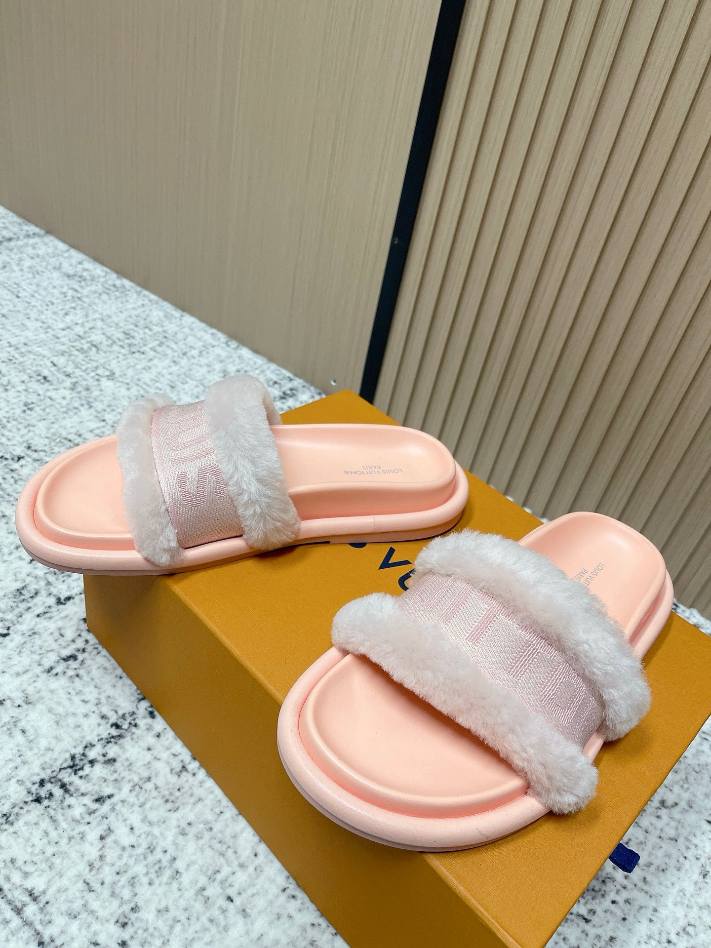 Louis Vuitton pink slide sandals with wide fuzzy strap
