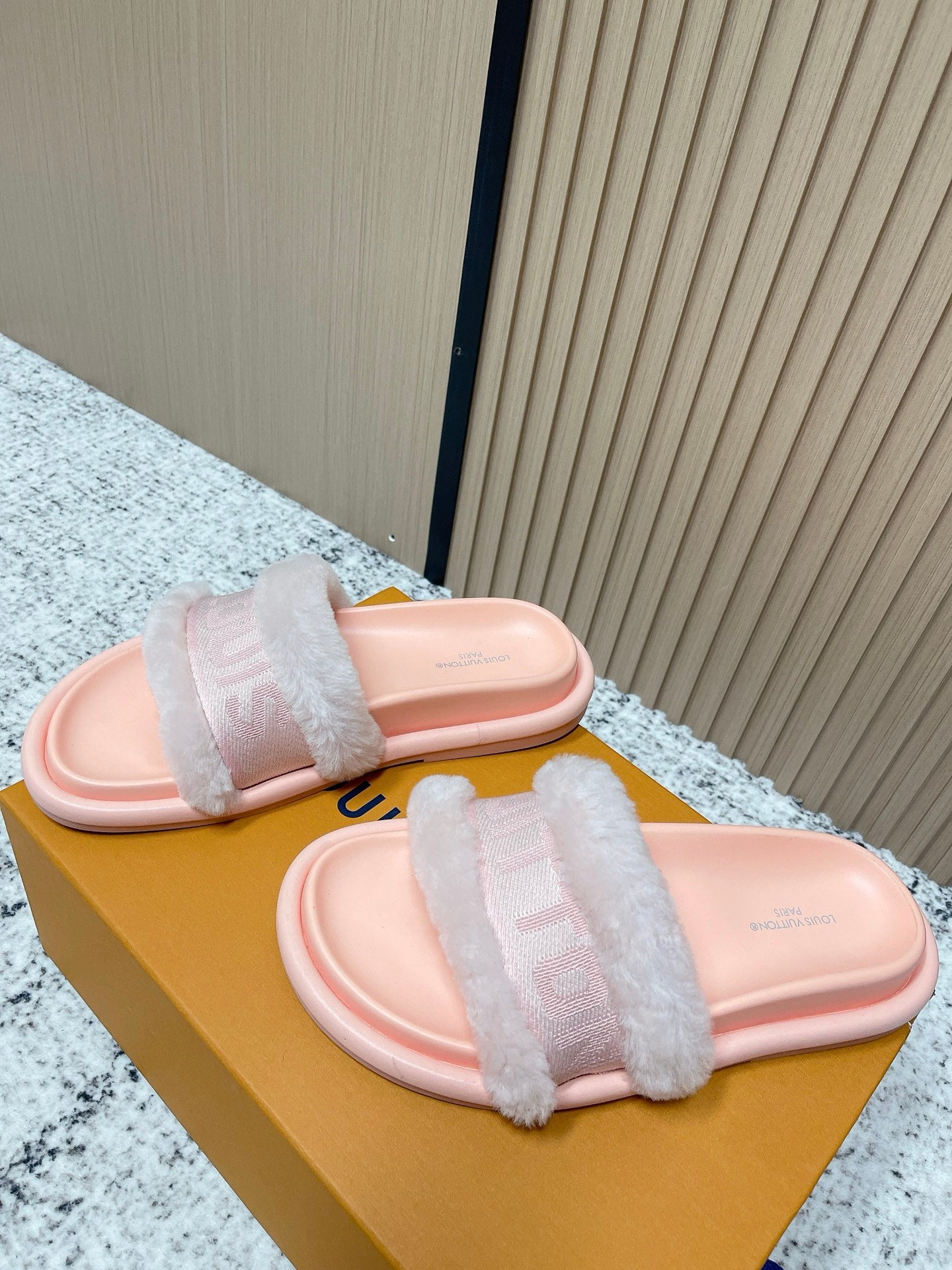 Louis Vuitton pink slide sandals with fuzzy strap and open toe