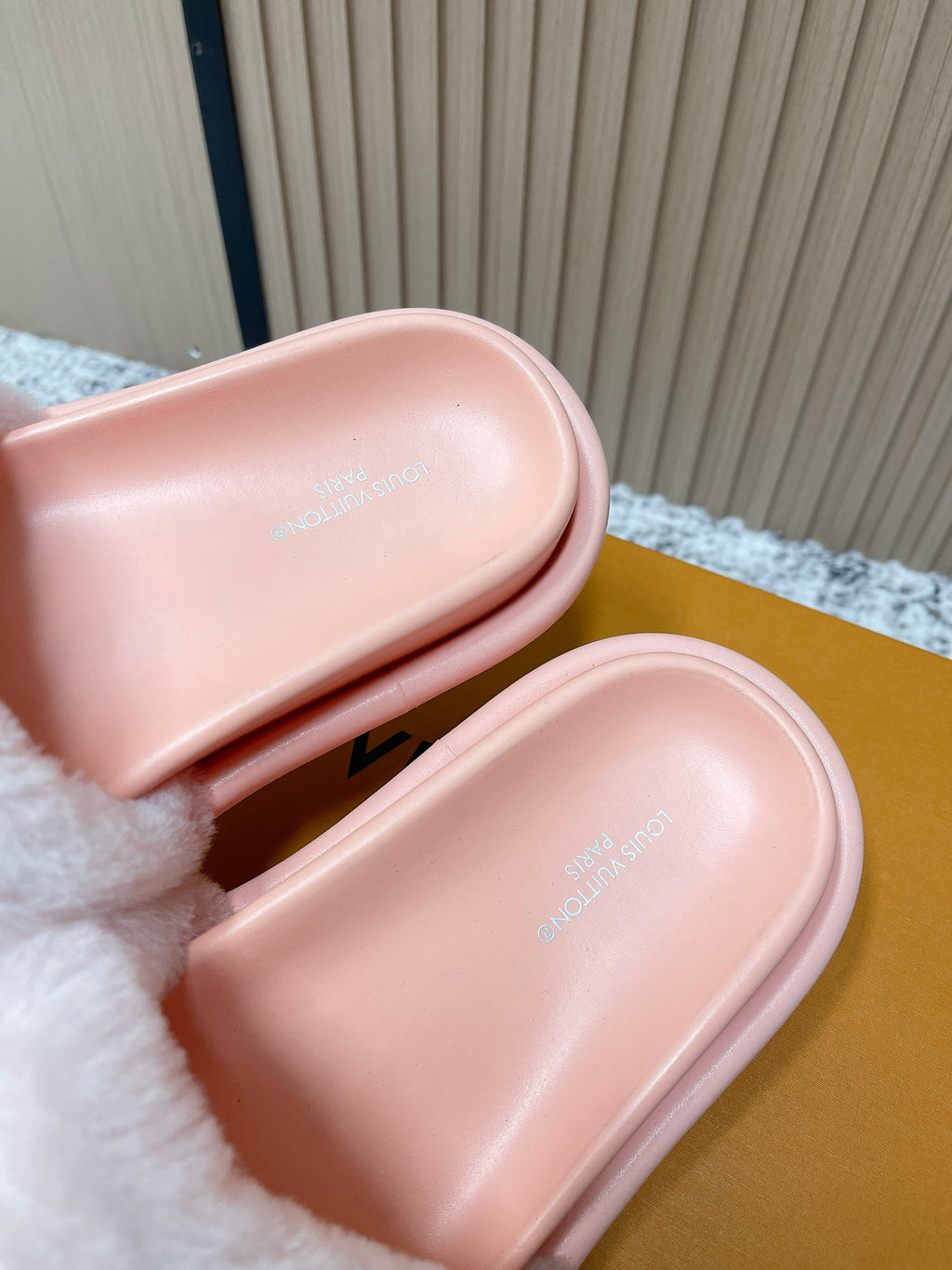 Louis Vuitton pink slide sandals close-up of footbed and fuzzy strap