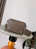 Taupe leather crossbody bag with front flap, silver-tone zippers and chain strap