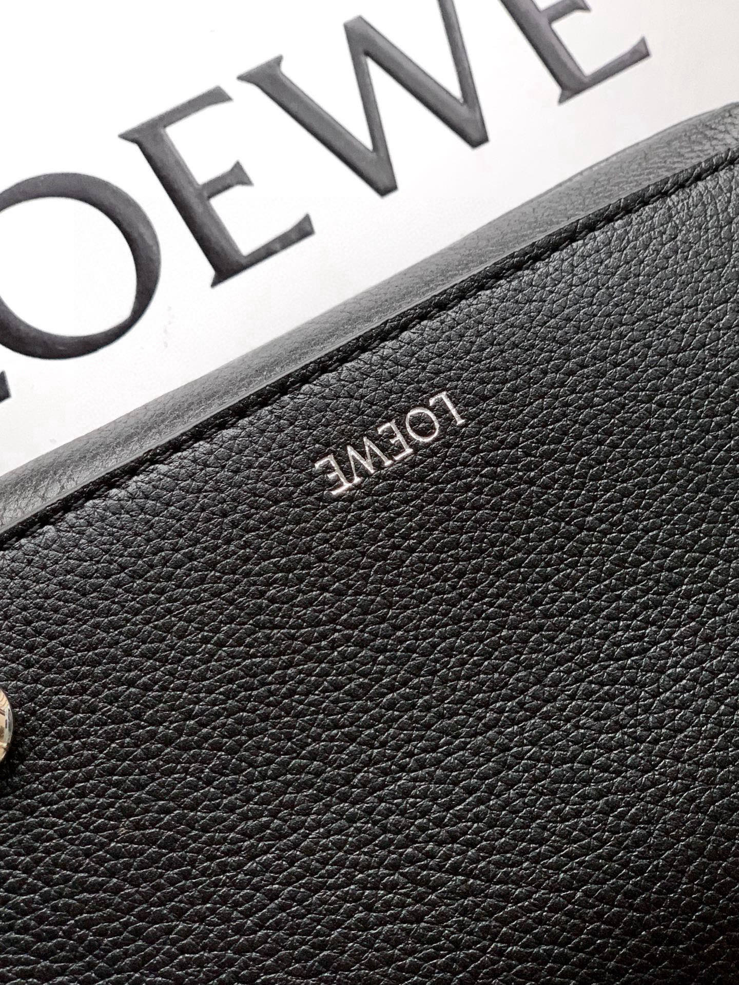 Embossed LOEWE logo on dark pebbled leather patch