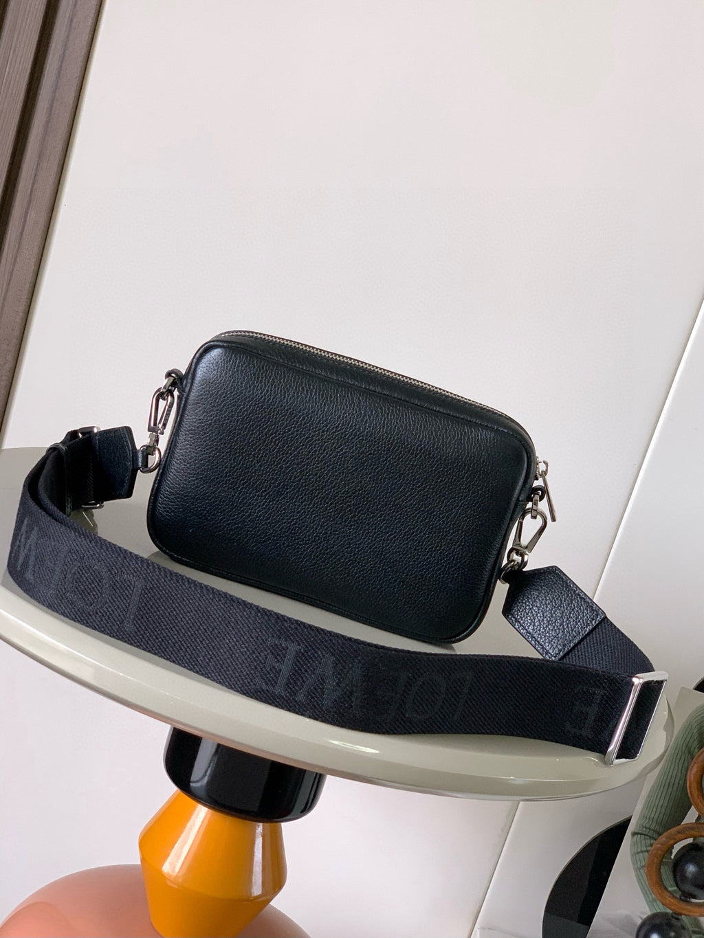 Men's crossbody bag in dark blue leather with jacquard logo strap and silver hardware