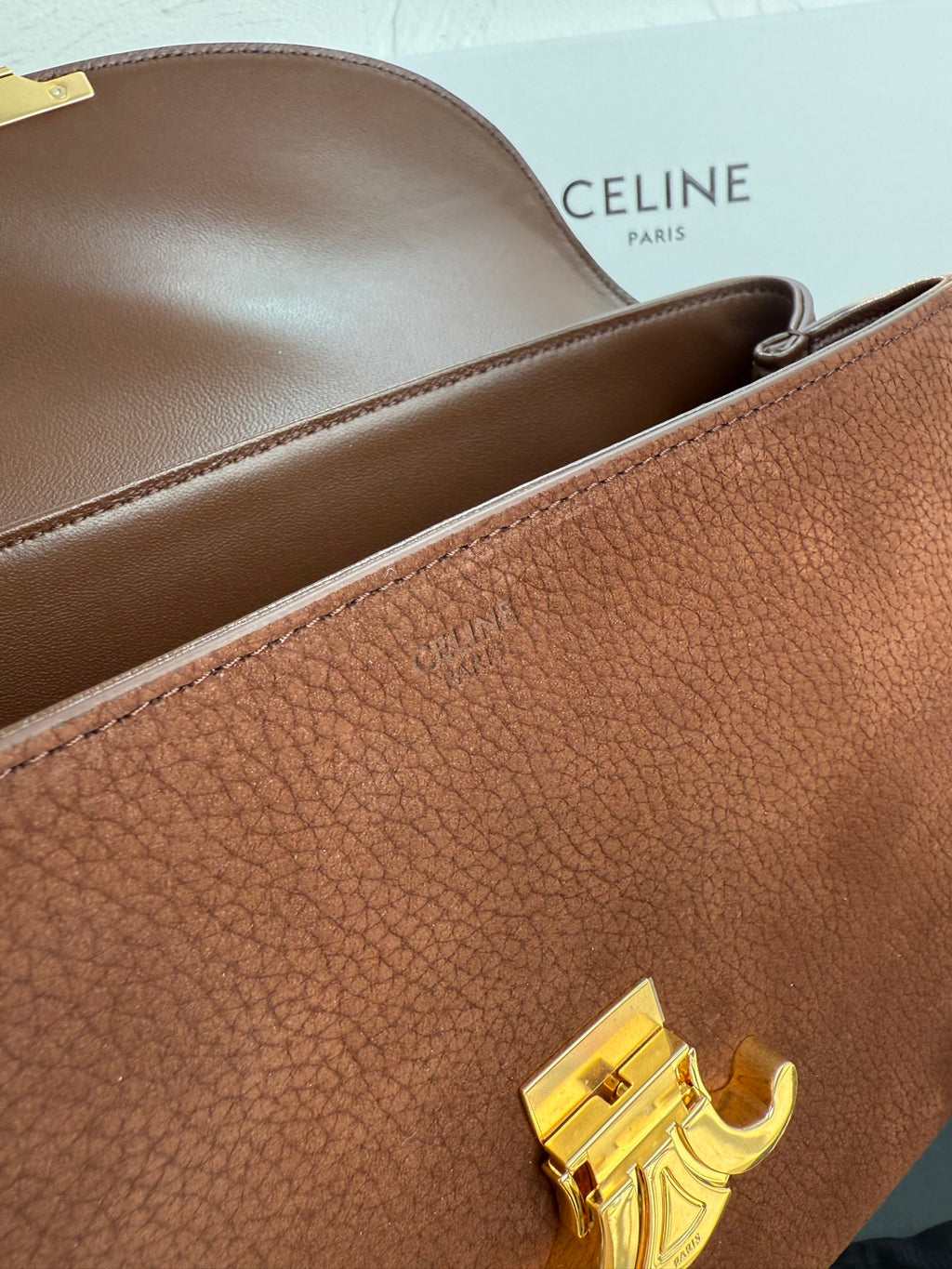 Celine brown leather bag with rolled top opening and gold-tone clasp hardware